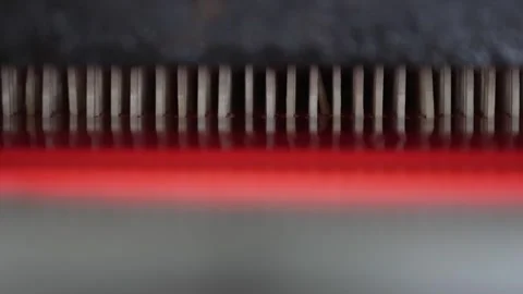 Macro Pan Across Match Sticks Glowing Red in Dipping Machine Vídeo Stock 339736926