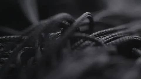 A macro pan of Black wired material Stock Footage 12128520