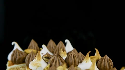 Macro panorama down on three pieces of double layer Kiev cake Video stock 94405041