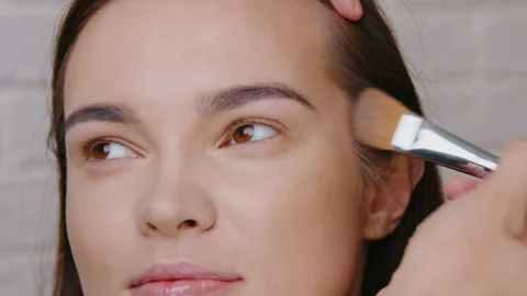 Macro Panorama of Model Face During Professional Makeup Application, Detailed Video stock 327791015