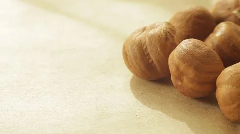 Macro panorama of peeled hazelnuts. Close up slow dolly shot. Stock Footage 62449609