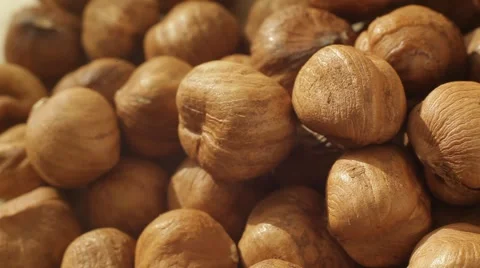 Macro panorama of peeled hazelnuts. Close up slow dolly shot. Stock Footage 62449710