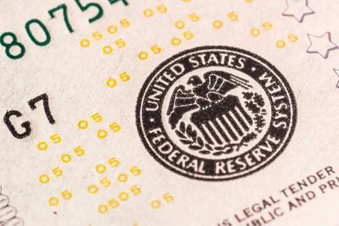 Macro. Part of a five-dollar bill with the symbol of an eagle. Stock Photos
