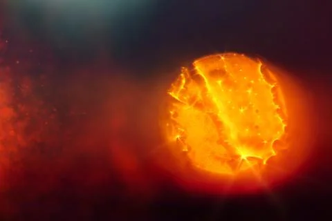 A macro particle of matter under a microscope, the energy of an atom, cosmic mat Stock Photos