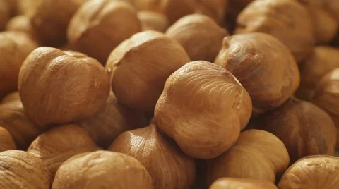 Macro of peeled hazelnuts. Close up slow dolly shot. Stock Footage 62449538
