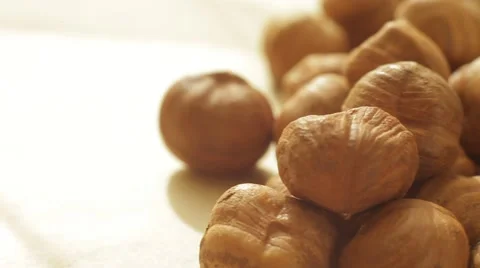 Macro of peeled hazelnuts. Close up slow dolly shot. Stock Footage 62449584
