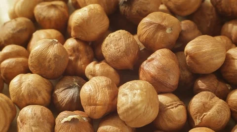 Macro of peeled hazelnuts. Close up slow dolly shot. Stock Footage 62449678