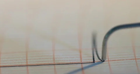 Macro of the pen from a lie detector machine Stock Footage 116559850