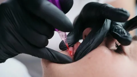 Macro Permanent Lip Tattoo Procedure Video stock 343748101