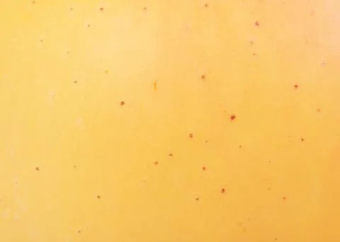 Macro photo of apple texture as background. Yellow apple background. Stock Photos