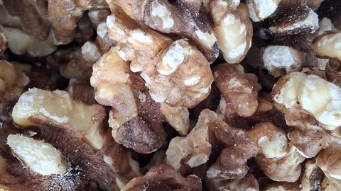 Macro photo of a collection of walnuts, texture background Foto stock