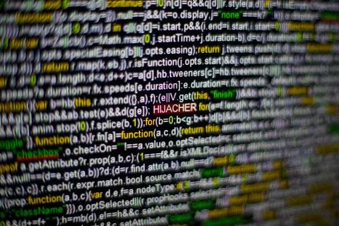 Macro photo of computer screen with program source code and highlighted HIJACKER Stockfoto's