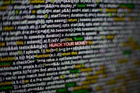 Macro photo of computer screen with program source code and highlighted HIJACK Stock Photos