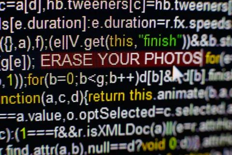 Macro photo of computer screen with program source code and highlighted ERASE Stock Photos