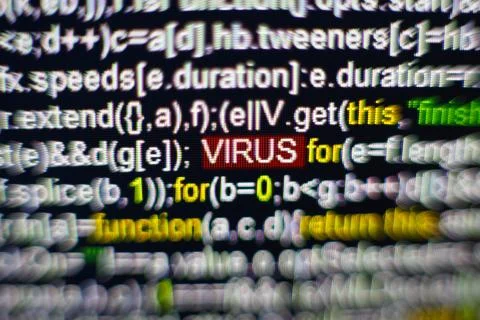 Macro photo of computer screen with program source code and highlighted VIRUS 스톡 사진