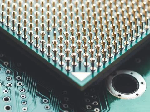 Macro photo of hard disk controller board and Central Computer Processor. CPU Stock Photos