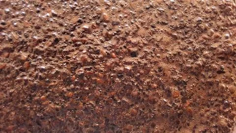 Macro photo of the surface of coarse liquid coffee 스톡 사진