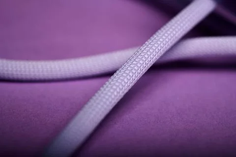 Macro photograph of a purple cable for data and power transfer Foto stock