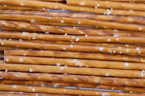 Macro photography capturing textures of salty pretzels under studio lighting. Hi Stock Photos