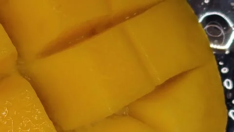 Macro photography of mango cubes Stock Footage 329648015