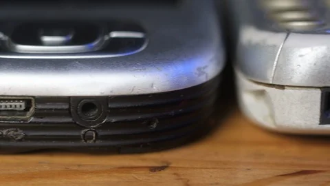 Macro photography of old outdated mobile cell phones. 库存影片 128095396