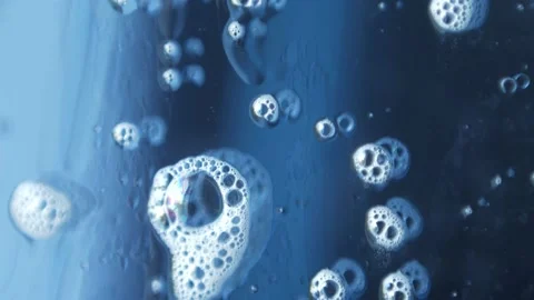 Macro photography of soap bubbles the window cleaning chemistry flows down the Stock Footage 153699869
