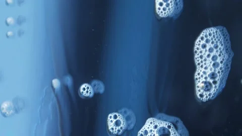 Macro photography of soap bubbles the window cleaning chemistry flows down the Stock Footage 153700103