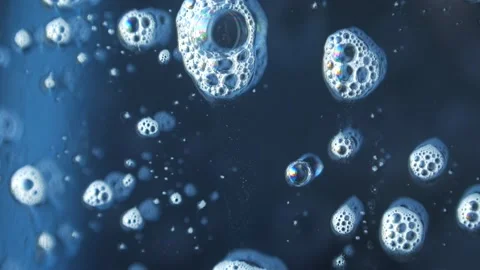 Macro photography of soap bubbles the window cleaning chemistry flows down the Stock Footage 153700278