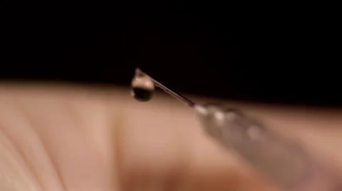 Macro photography of a syringe with the liquid Stock Footage 67397353