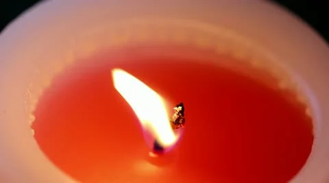 A Macro of a Pink Colored Candle Flame Stock Footage 11080307