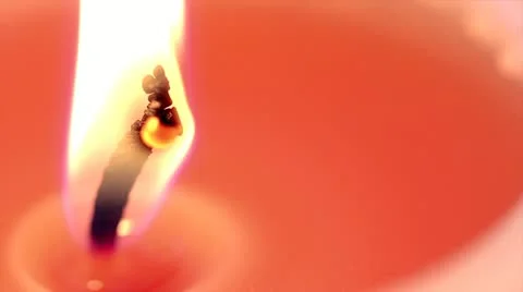 A Macro of a Pink Colored Candle Flame Stock Footage 11080599