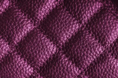 Macro of pink quilted leather texture background with stitched pattern and .. Stock Photos