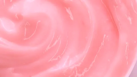 Macro pink smooth eye, skin cream texture, close-up beauty facial cosmetics mask Stock Footage 286947424