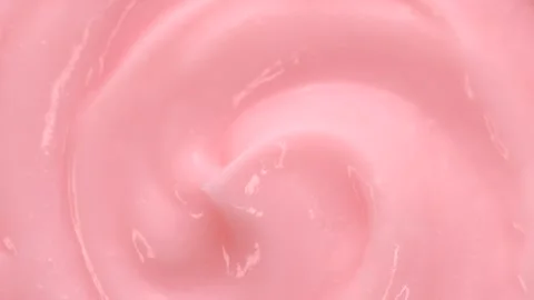 Macro pink smooth eye, skin cream texture, close-up beauty facial cosmetics mask Stock Footage 313465582