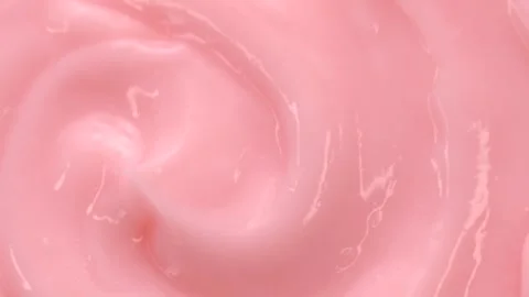 Macro pink smooth eye, skin cream texture, close-up beauty facial cosmetics mask Stock Footage 314248802