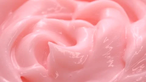 Macro pink smooth eye, skin cream texture, close-up beauty facial cosmetics mask Stock Footage 315017357