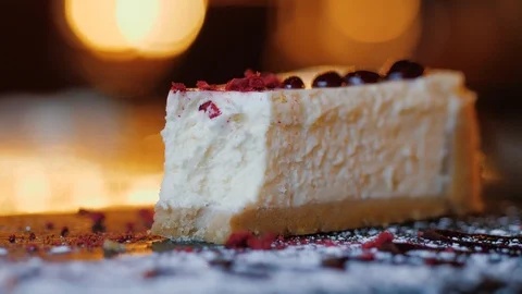 Macro plan: fork cuts a piece of white tasty cake Stock Footage 106308875