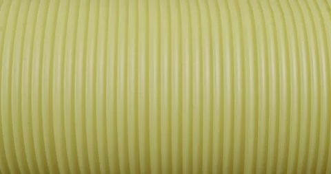 Macro plastic corrugation pipe. The texture of the compressed spring is close-up 스톡 동영상 165648331