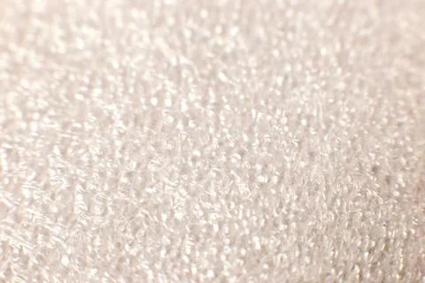Macro plastic foam texture in white. Selectiv focus Stock Photos