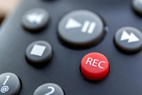 A macro portrait of the record button of a television or other multimedia dev Stock Photos