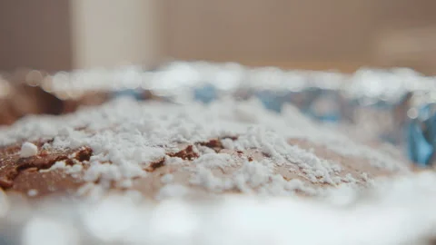 Macro powdered chocolate cake baking closeup texture with sugar crystals on Stock Footage 345530263