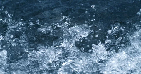 Macro of powerful river flowing stream of cold fresh pure water crushing waves Stock Footage 268406131