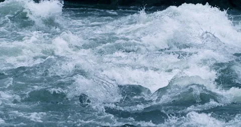 Macro of powerful river flowing stream of cold fresh pure water crushing waves Stock Footage 268406226