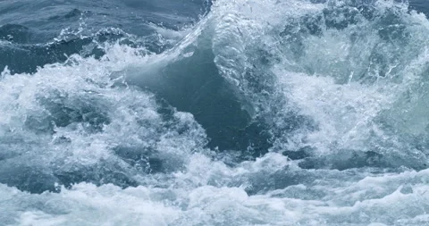 Macro of powerful river flowing stream of cold fresh pure water crushing waves Stock Footage 268406349