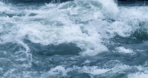 Macro of powerful river flowing stream of cold fresh pure water crushing waves Stock Footage 268406453