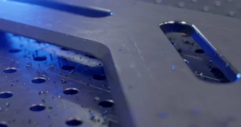 Macro of a precision-cut slot in a thick industrial metal plate Stockbeeldmateriaal 329476551