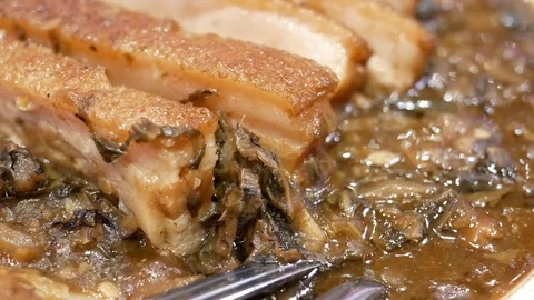 Macro of preserved vegetables with layer pork on plate with steam Stock Footage 79364480