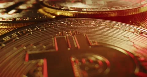 Macro probe lens flying over a stack of bitcoin. Stock Footage 162914585