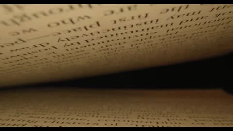 Macro Probe Lens Pushing Through Book Pages 4K Stock Footage 331299701