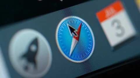 MACRO: Pushing the Safari browser icon Stock Footage 91727822